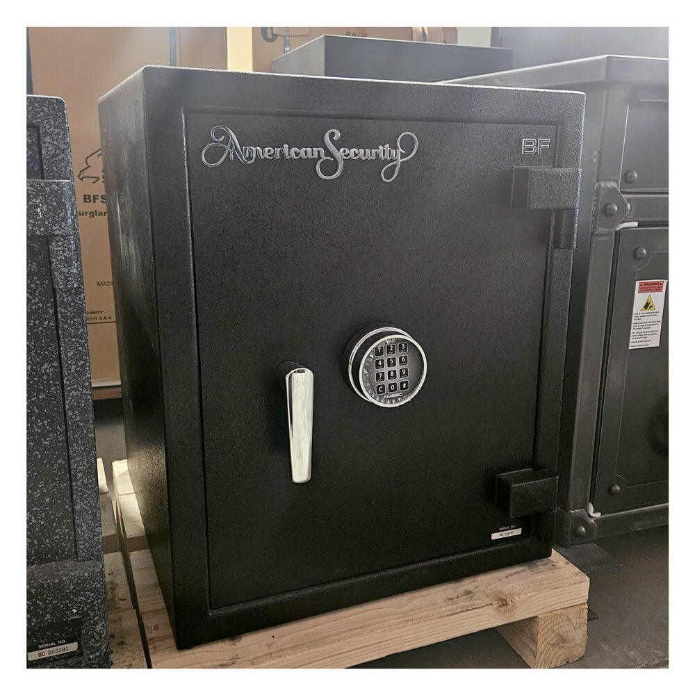 Used Dean Safe AMSEC BF2116 fire-rated burglary safe, black exterior with text label, UL listed for security and fire protection.