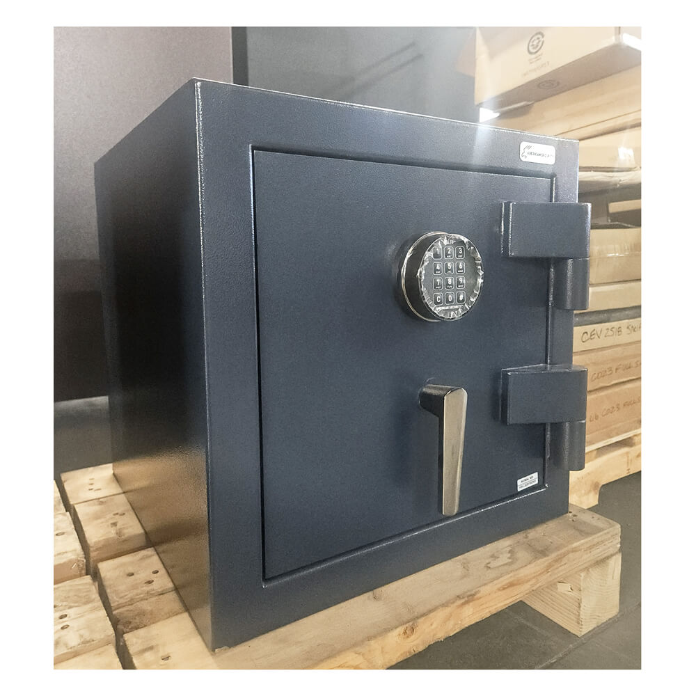Blue safe on a wooden pallet with a neutral background