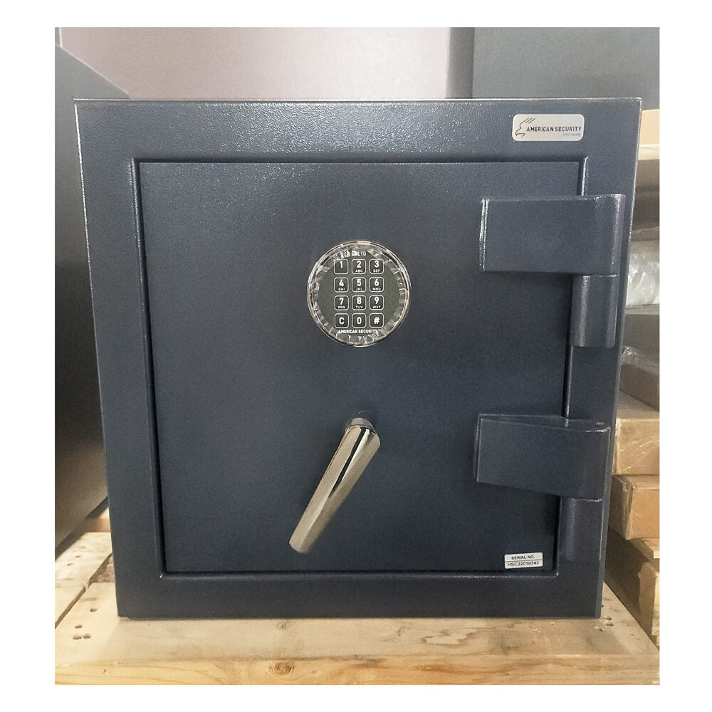 Blue safe with digital keypad on a wooden platform