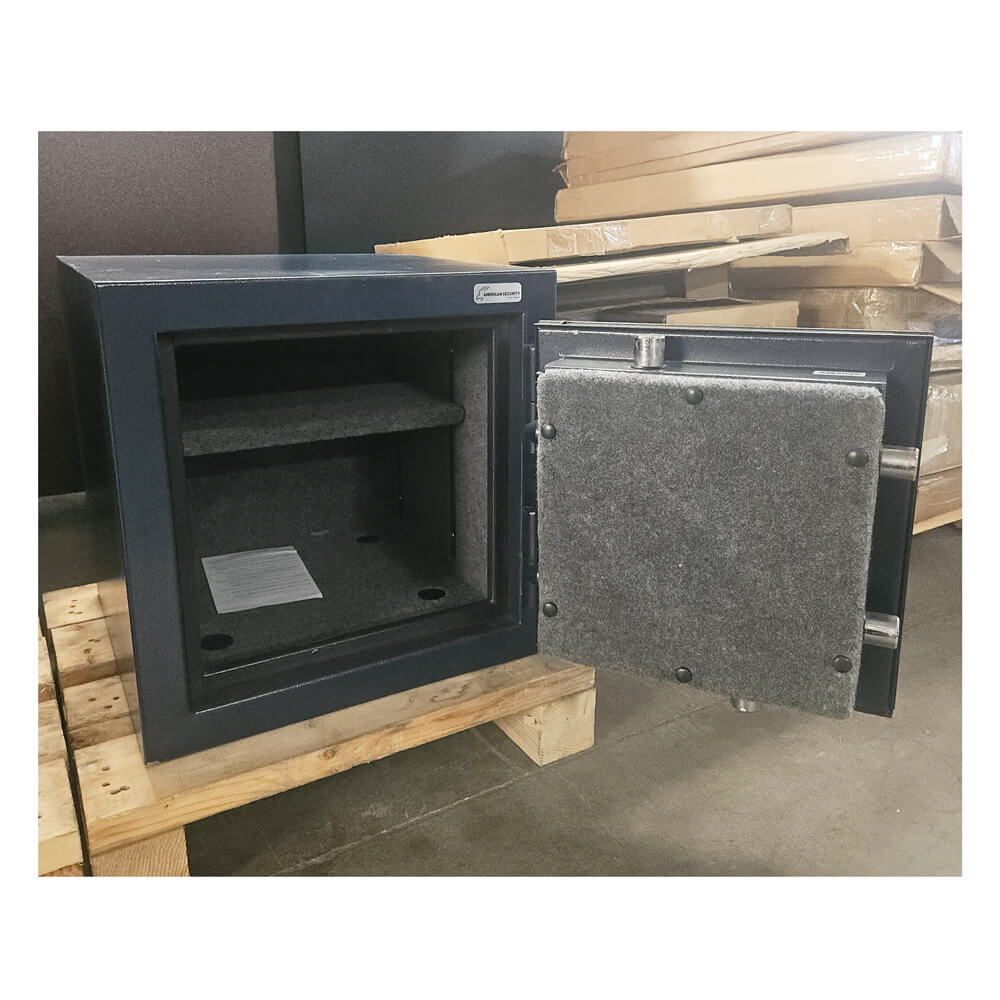 Open dark blue safe box on a wooden pallet with a dark background