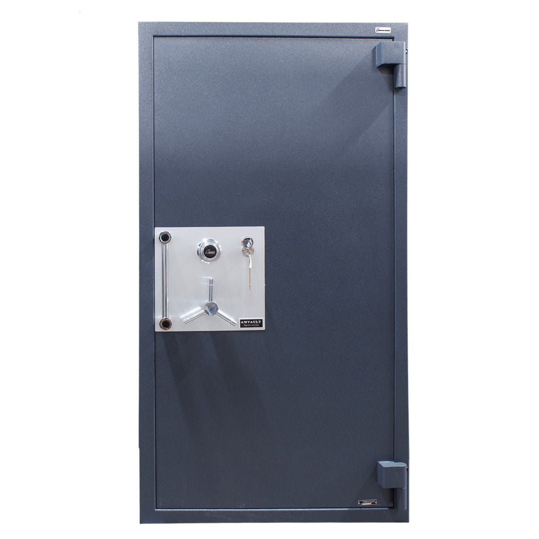 Metallic safe door with a lock mechanism on a white background