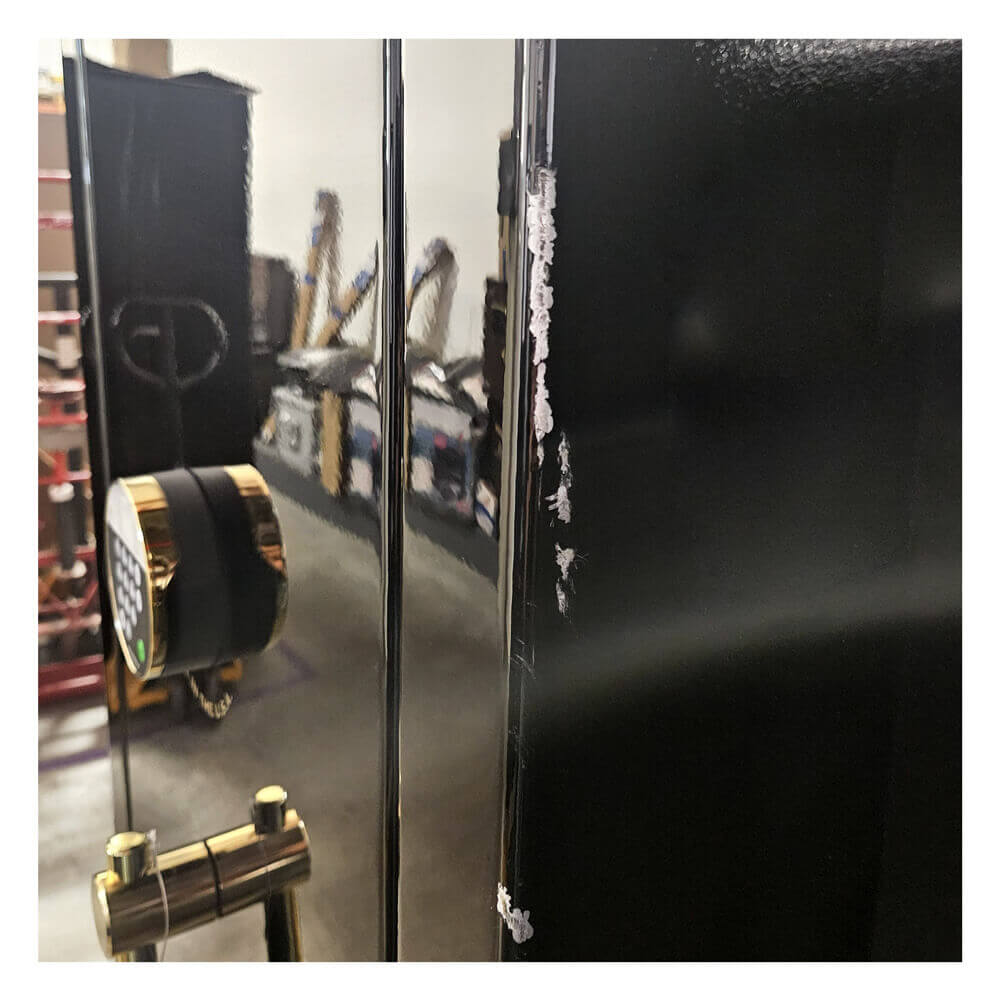 Dean Safe Liberty Premium 17 LP17 home safe in black gloss with visible paint scratches and blemishes on the surface.