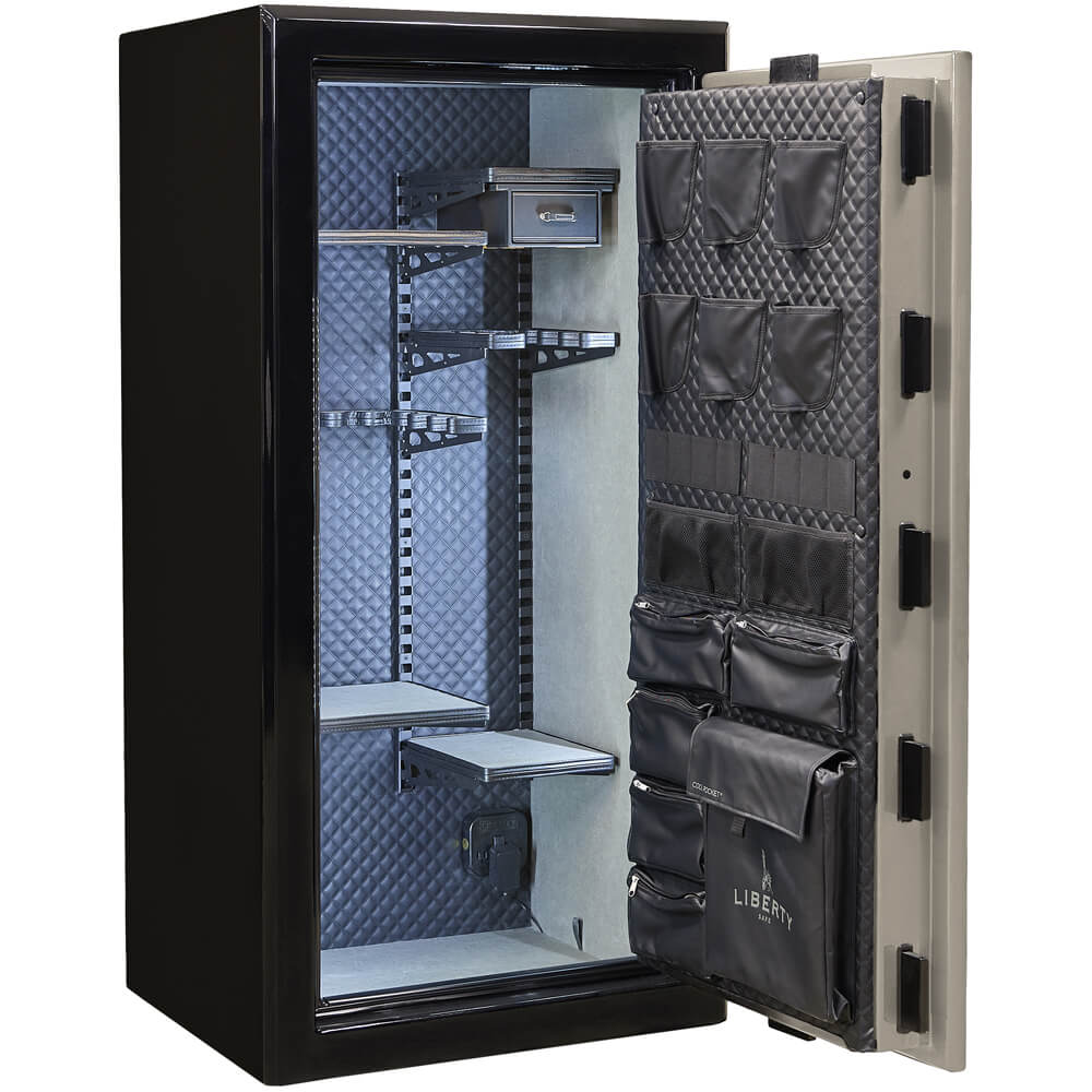 Open Liberty Presidential Signature 25 Gun Safe with champagne finish, showing interior shelving and secure locking mechanism.