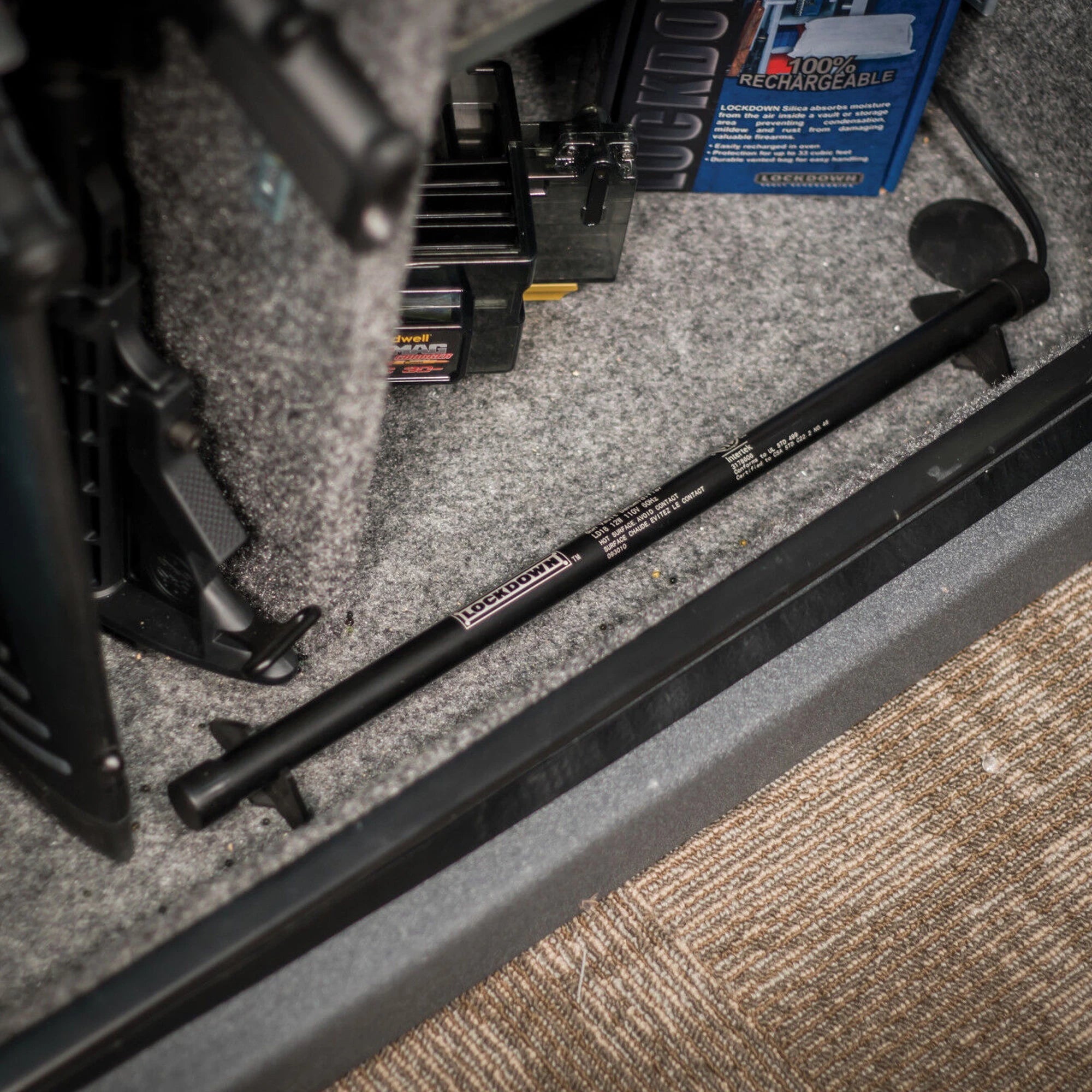 Lockdown 18-inch dehumidifier rod gun safe accessory shown in a safe interior