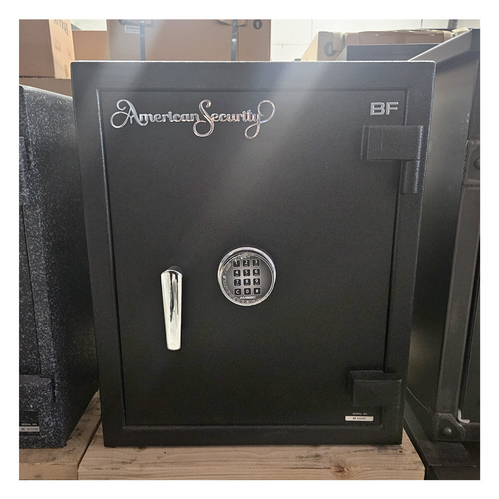 Used Dean Safe AMSEC BF2116 fire-rated burglary safe with black finish, UL listed, showing the front with text and secure locking mechanism.