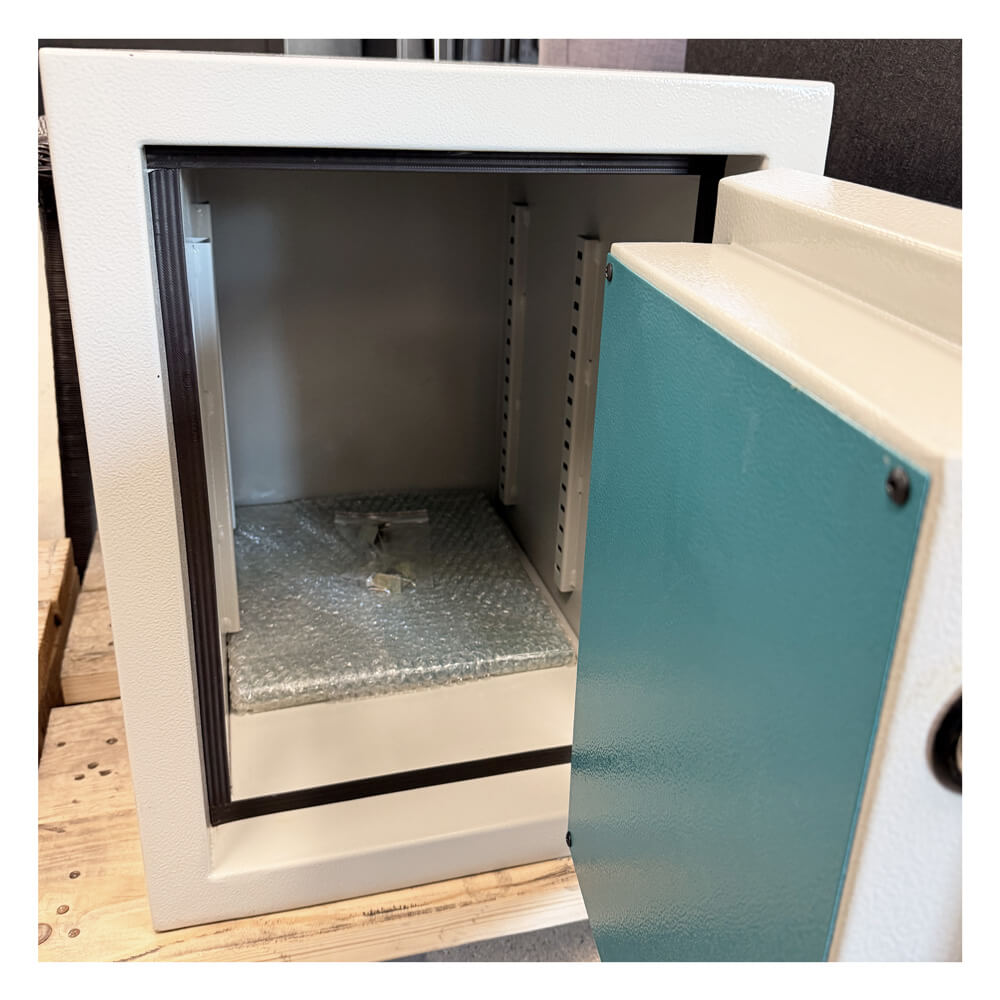 Used Dean Safe Stealth CS20 high security burglar and fire safe with white exterior, showing wear and tear on the safe's surface.