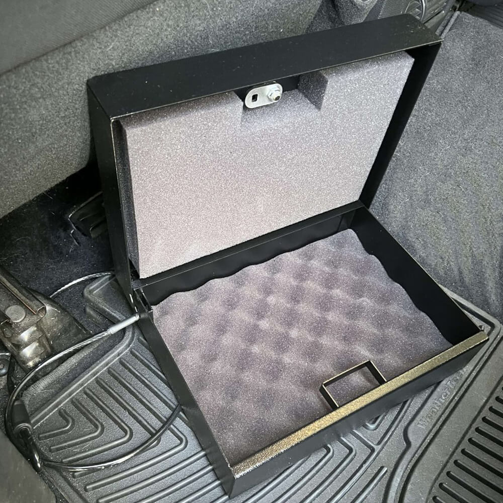 V-Line V-Line E-Z Vault TD handgun safe with door open, showing interior storage for handguns and security features.