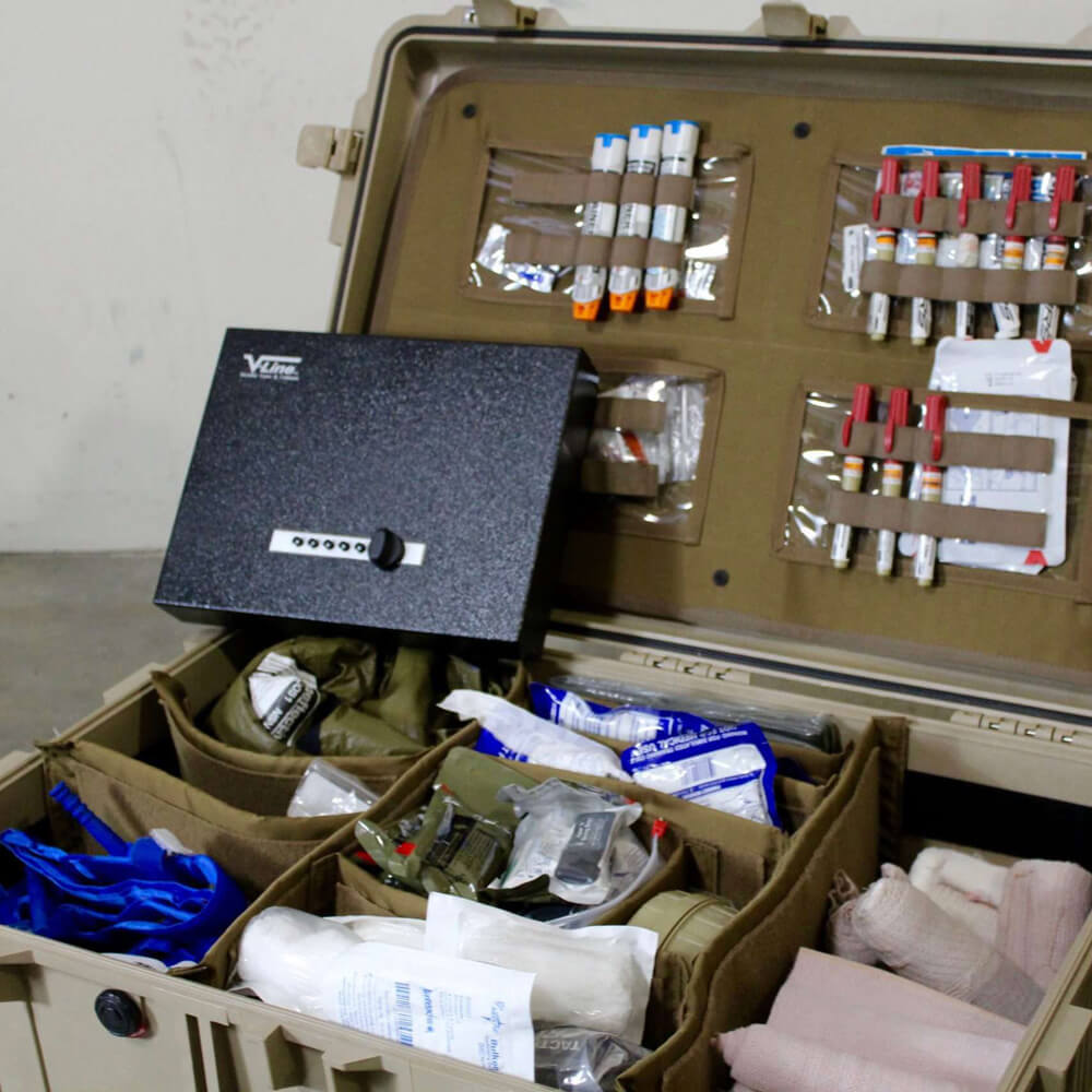 V-Line Top Draw XD handgun safe with heavy-duty lock cover, shown in rescue team setting, secure firearm storage.
