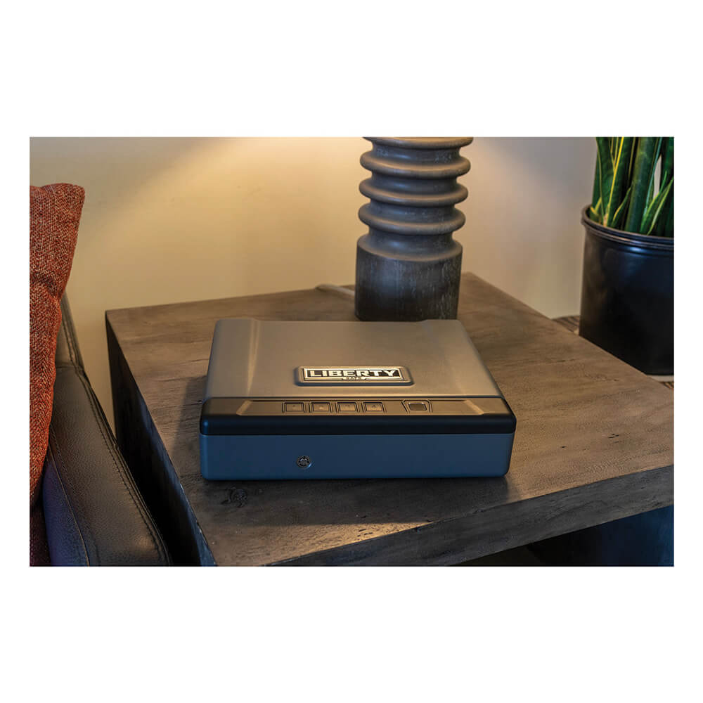 Liberty HDV-150X biometric handgun safe with digital keypad and interior for secure pistol storage.